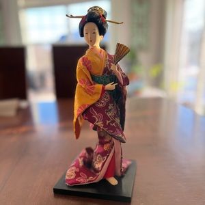 Beautiful Japanese Doll in Kimono with fan